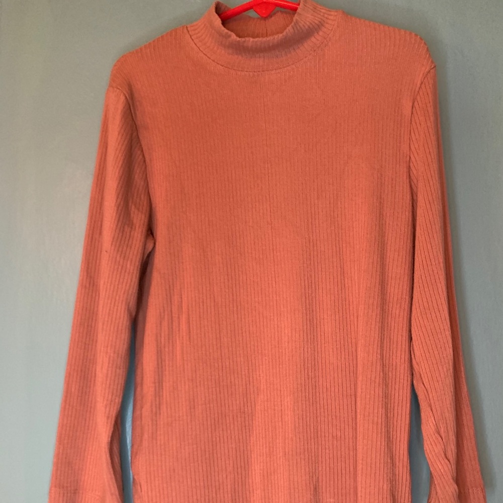Soft pink turtleneck